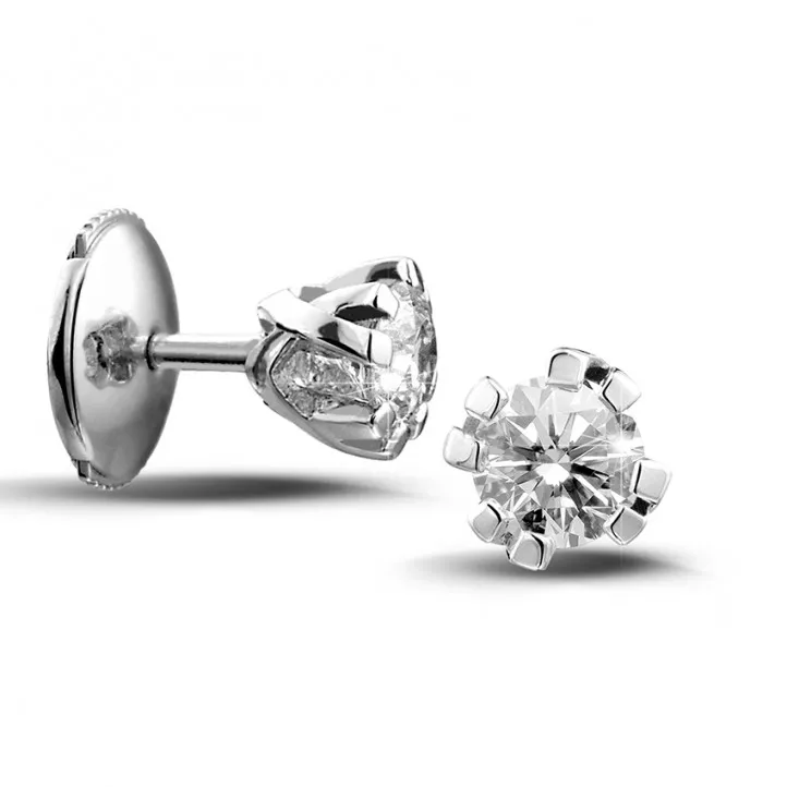 0.60 quilates pendientes diamantes diseño en oro blanco con ocho garras 