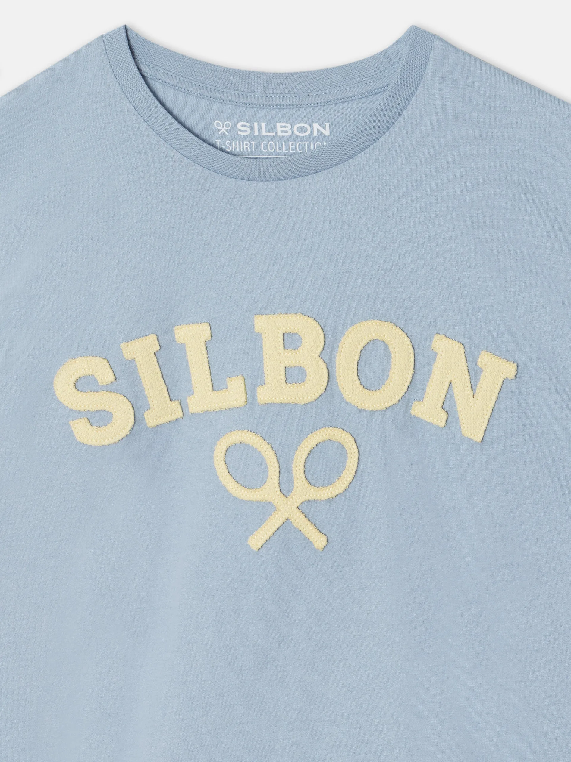 Camiseta silbon raqueta media azul